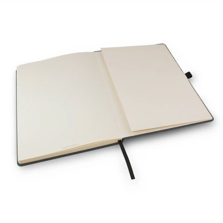 Envirobook A4 black charcoal notebook opened to back page showing the envelope pocket