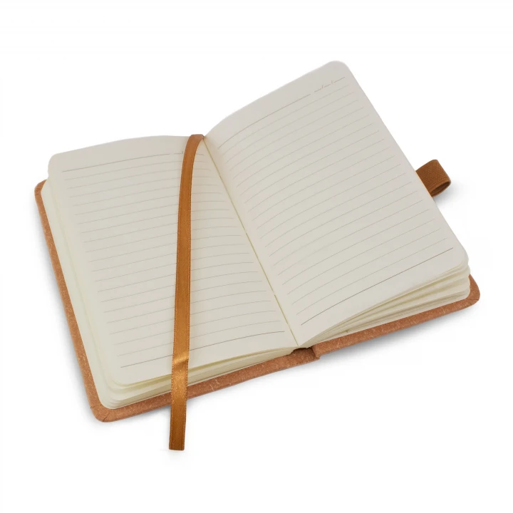 Envirobook A6 natural notebook opened to middle page showing lined pages and ribbon page marker and pen holder