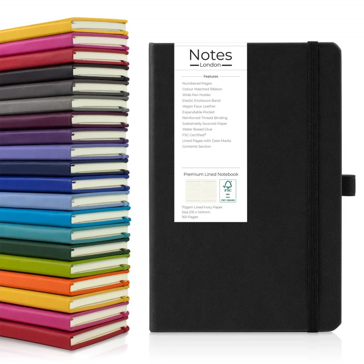 Holms A5 premium notebook in black showing front cover to the right with the seventeen available colours stacked on top of each other to the left