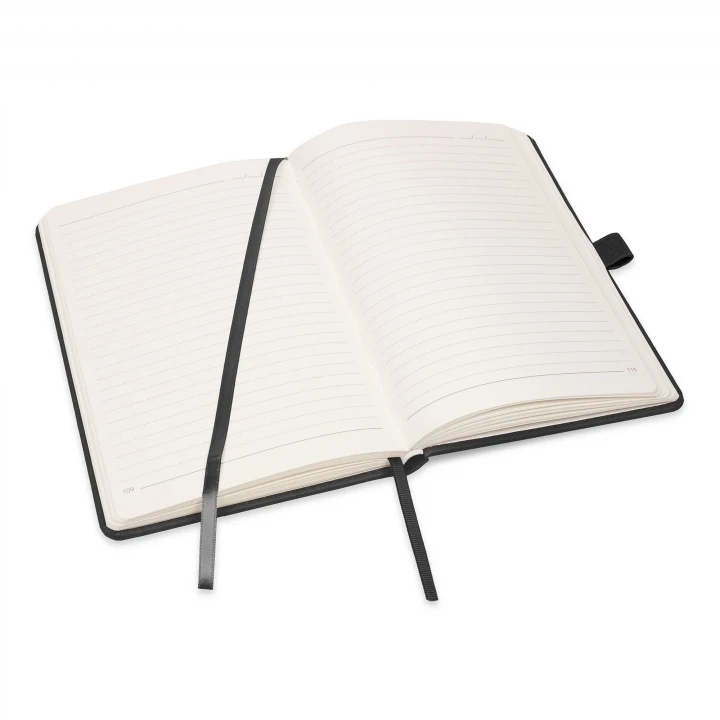Moretti A5 black notebook opened to middle page showing lined pages and ribbon page marker