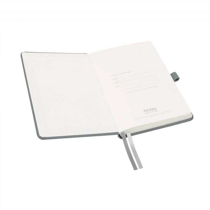 Moretti A5 light grey notebook opened to front page showing four lines to write the contents of your notebook