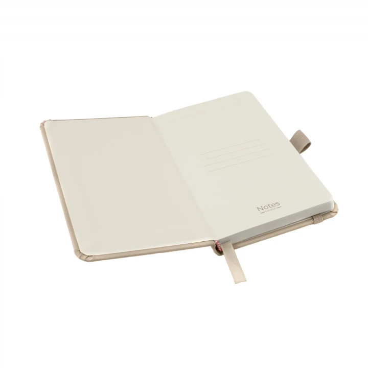 Wilson A6 pastel mushroom notebook opened to front page showing four lines to write the contents of your notebook