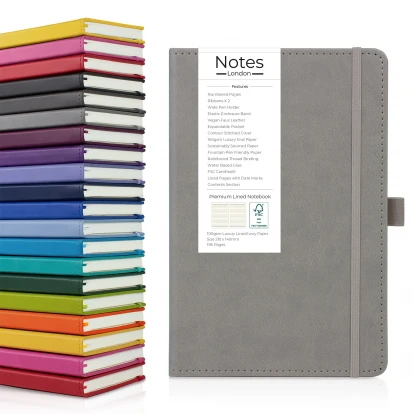 Moretti A5 luxury notebook in light grey showing front cover to the right with the seventeen available colours stacked on top of each other to the left